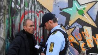 Police officer reprimanded by guerilla gardening activist @ Byhave 69, CPH