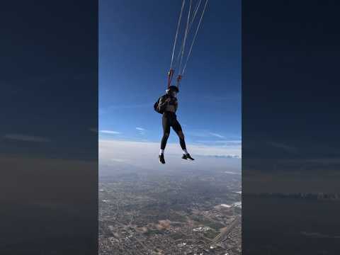 Skydive parachute opening in slow motion