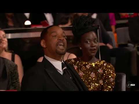 Chris Rock punch by will Smith for making jokes of his wife Jeda Pinkett at Oscars ward's 2022.