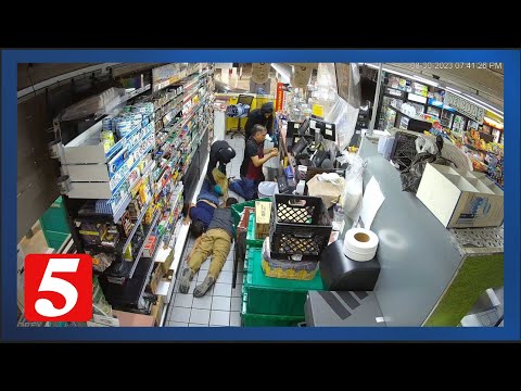 Video shows gas station robbery, with suspects pinning workers to the ground