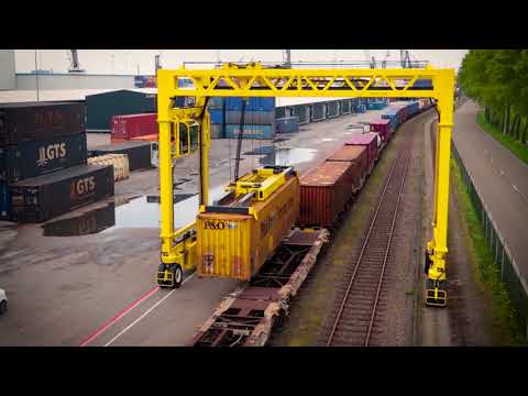 Combilift Straddle Carrier in-action: Straddle Rail Cargo Terminals -  By Mabo B V