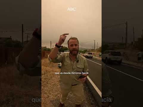 Miles de personas huyen por carretera del incendio en la sierra oeste de Madrid