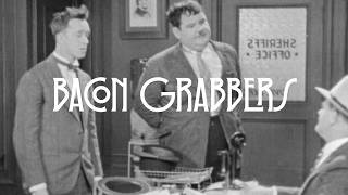 Laurel & Hardy keep forgetting their hats