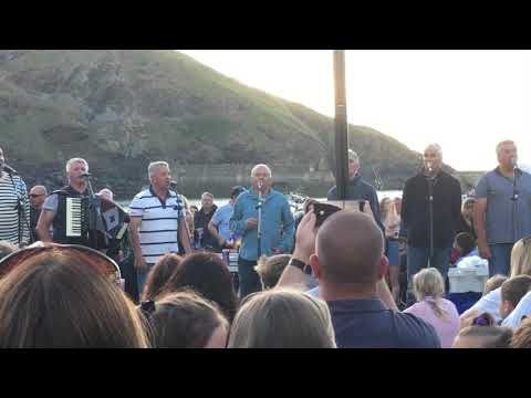 Fisherman’s Friends singing Pass Around the Grog 2019.
