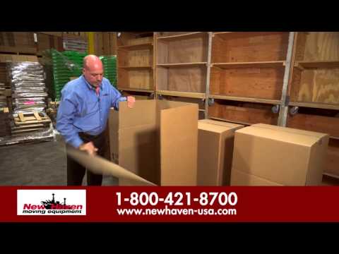 Part of a video titled How to Use Wardrobe Box for Packing -New Haven Moving Equipment