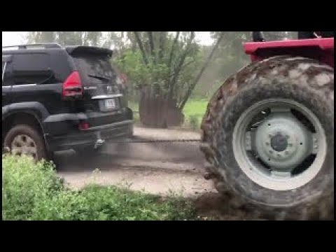 toyota land cruiser prado vs tractor massey ferguson 385 #2021 TUG OF WARS #CARS