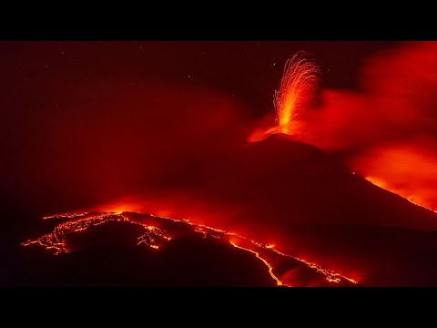 Mount Etna glows with lava as eruptions light the night sky