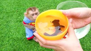 Cute Monkey 🐵🐵🐵 Opening Surprise Eggs With Fish In Aquarium | Satisfying Oddly Funny Video
