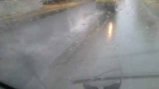 preview picture of video 'укладка асфальта под дождём :( 2011-10-05-16-14-57'