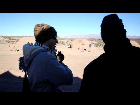 Shooting Colt AR-15 w/ fully automatic rifle