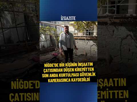 Bir kişinin inşaatın çatısından düşen kiremitten son anda kurtulması güvenlik kamerasına yansıdı