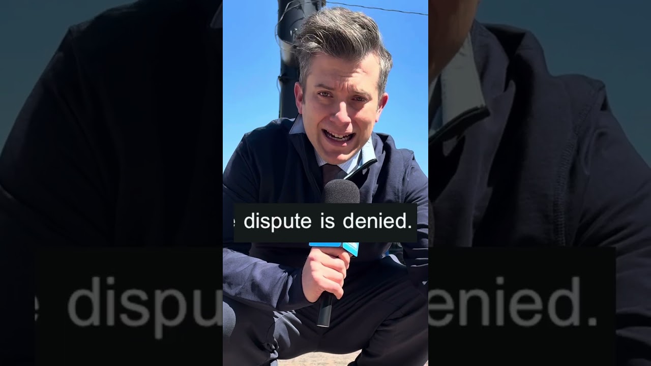 A $102 ticket for parking over the line? What line?
