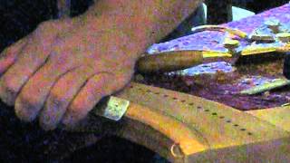 Shaping the neck of a small wire harp with high tech cordless tools. Pt. II