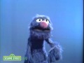 Sesame Street: Grover Shows Us Back & Front