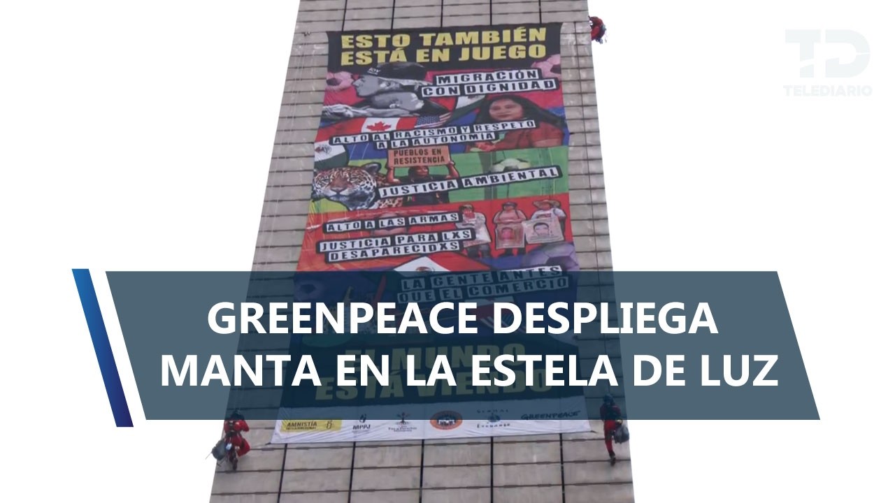 Greenpeace escala y despliega manta monumental en la Estela de Luz; exigen justicia ambiental