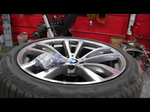 Part of a video titled WHY ARE OEM BMW RIMS & TIRES SO EXPENSIVE! (FACTS) - YouTube