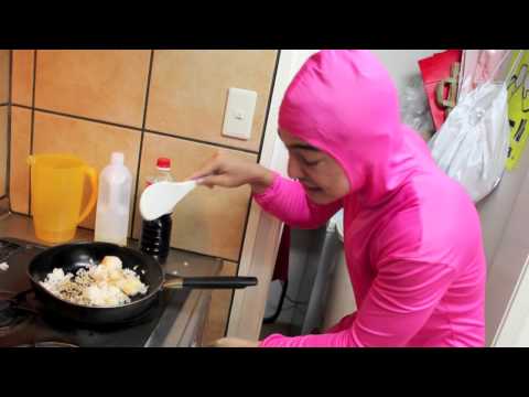 PINK GUY COOKS FRIED RICE AND RAPS