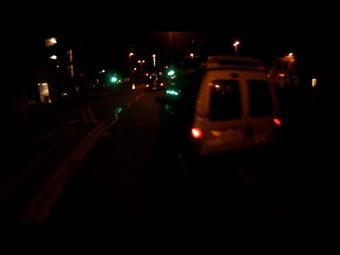 SH06JVZ - MGIF Taxi Cuts Up Cyclist