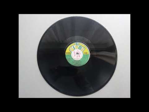 Dennis Brown & Nigger Kojak Ain't That Loving You