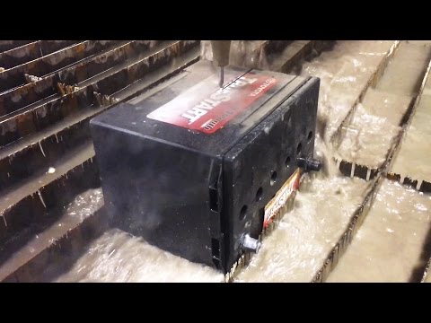 A Car Battery and Alternator cut in half With A Waterjet Video
