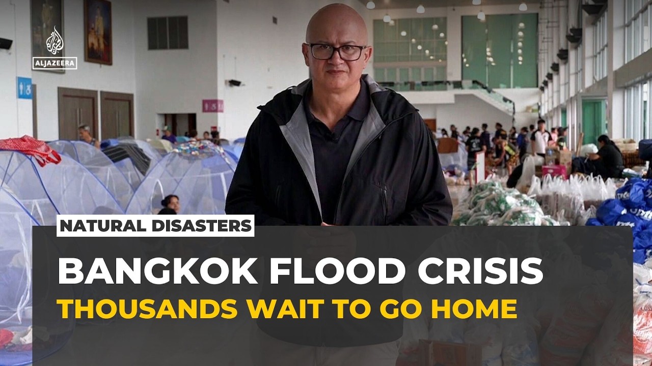 Bangkok floods displace thousands as waters remain slow to recede