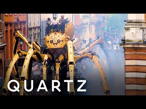Giant spider and minotaur robot puppets on the streets of France