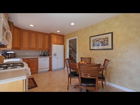 A split-level Elmhurst home with a great deck and yard A split-level Elmhurst home with a great deck and yard