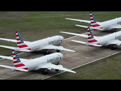 美國航空公司發出新的裁員警告 (American Airlines sends fresh furlough warnings)