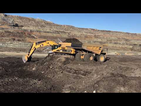 Caterpillar 385C Excavator Loading Caterpillar Dumpers 775 -773 With Coal - Labrianidis Mining Works