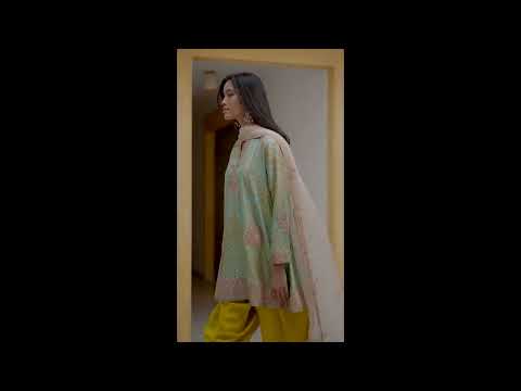 Indian Designer Nidhi Tholia's latest festive collection 2024 of bright kurtas on Ogaan.com