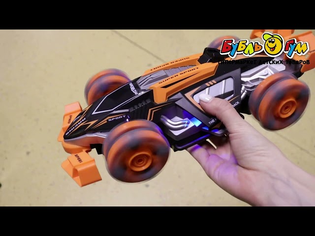 Машинка трюковая р/у Super sport Дрифт световые и звуковые эффекты с дымом 1:12 акб - видео