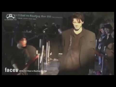 Energetic dance two guys in the clothes of Yohji Yamamoto