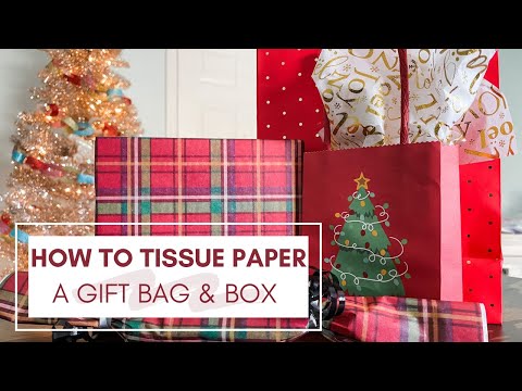 Part of a video titled How To Tissue Paper A Gift Bag & Box | Holiday Gift Wrap Series Ep. 3