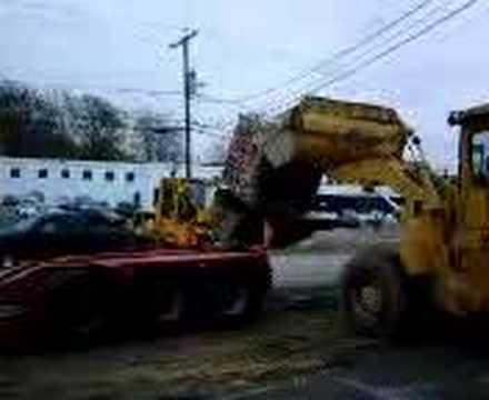 Regis tractopelle humour caillou