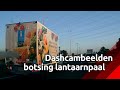 Op dashcambeelden is te zien hoe de vrachtwagen slingert en een lantaarnpaal uit de grond rukt.