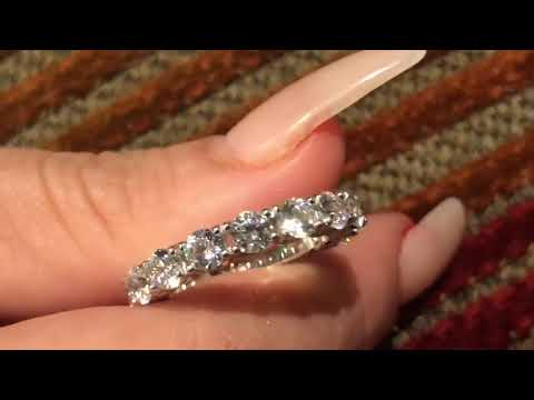 Platinum Wedding band with .25 round cz stones in prong setting