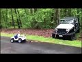 the kid pulls the jeep out of the ditch