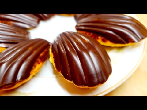 Madeleine a l'orange, en coque chocolat. مادلين البرتقال والشوكولاتة