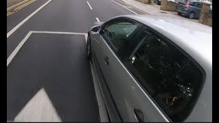 ROAD RAGE - Driver Punishes Cyclist For Not Using Blocked Cycle Lane