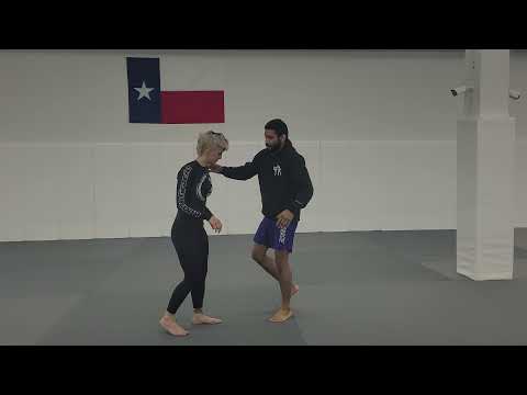 Nick Ortiz teaching an alternative to the Kani Basami(rolling into the legs from single leg defense)