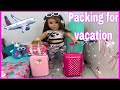 American Girl doll Packing her suitcase for vacation