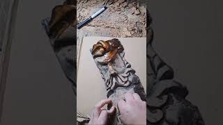 Woodcarving a Viking, finishing.