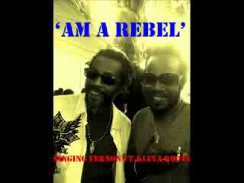 KLEVA ROOTS FT.SINGING VERNON-AM A REBEL SLIDE 0002