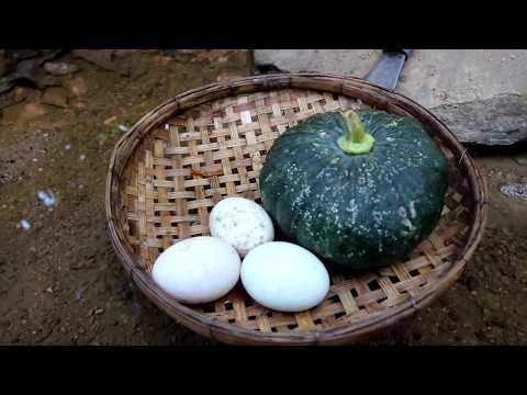 Survival skills: Eggs in the pumpkin burned in the ground for food - Cooking eggs eating delicious Video