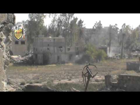 عملية تفجير أحد الأبنية التي يتمركز فيها عناصر النظام في حي الحويقة من قبل لواء الإسلام في دير الزور