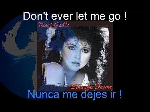 Nicci Gable  -  Strange Desire - (Spanish Translation - México)