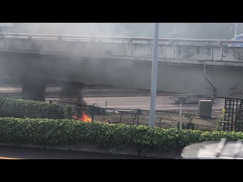 Raw: Fire under Clay Street overpass in Portland appears to be near homeless camp