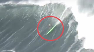 Watch Pro Surfer's Epic Wipeout Atop 50 Ft. Wave