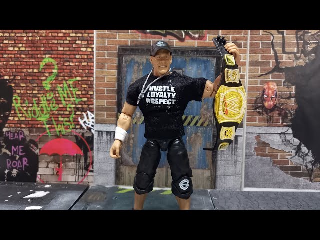 Vídeo relacionado con Mattel WWE Ultimate Edition John Cena, Figura de acción y Accesorios, Conjunto con Figura Coleccionable de 15,24 cm con Cabezas y Manos Intercambiables y 30 Puntos de articulación, JHV97