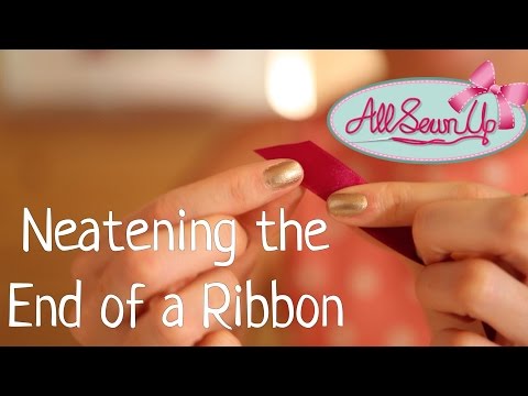 Part of a video titled Neatening the End of a Ribbon: Sewing Tips - YouTube